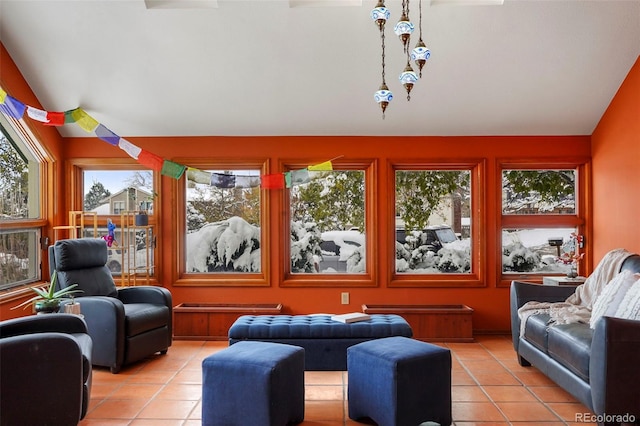 sunroom / solarium with vaulted ceiling and plenty of natural light