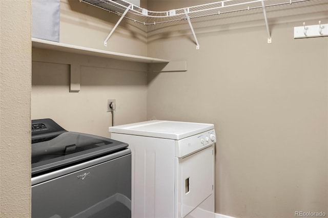 laundry room featuring washer and dryer