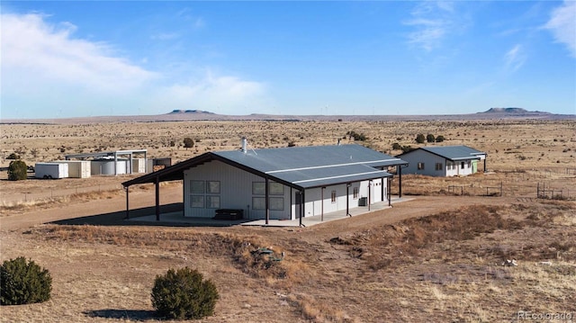 exterior space featuring a mountain view