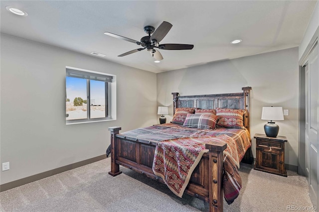 carpeted bedroom featuring ceiling fan