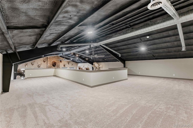 interior space featuring carpet and lofted ceiling