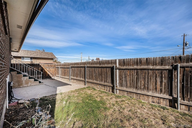 view of yard with a patio area