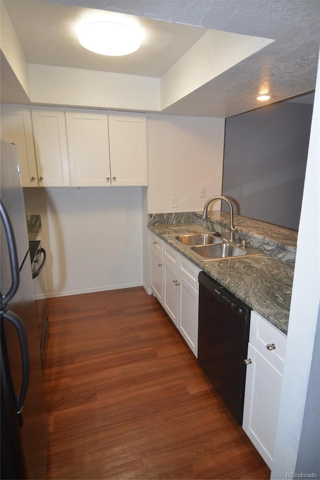 kitchen featuring stainless steel fridge, sink, dishwasher, dark hardwood / wood-style floors, and white cabinets