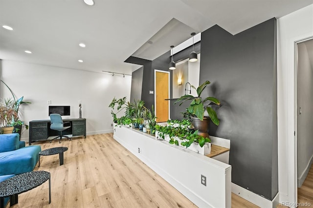 2565 Champa St, Denver, CO 80205 - home office featuring light wood finished floors and recessed lighting