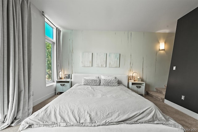 2565 Champa St, Denver, CO 80205 - carpeted bedroom featuring baseboards