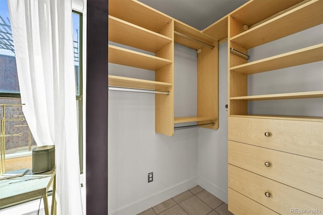 2565 Champa St, Denver, CO 80205 - spacious closet with tile patterned flooring