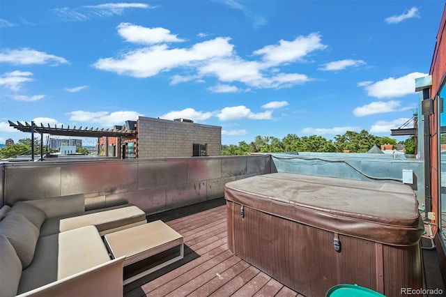 2565 Champa St, Denver, CO 80205 - wooden deck with a hot tub and an outdoor hangout area