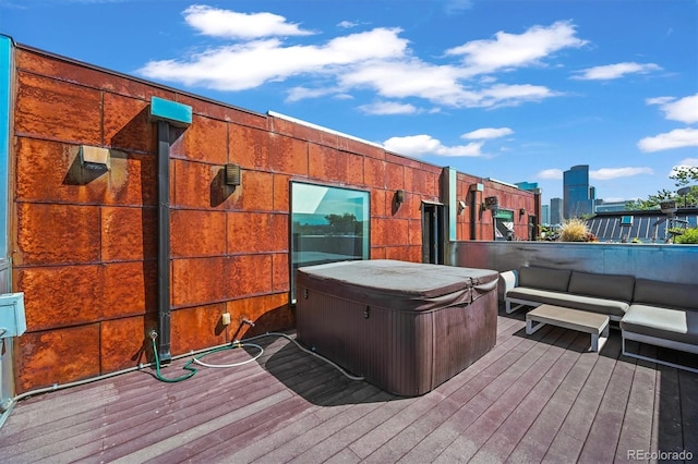 2565 Champa St, Denver, CO 80205 - wooden terrace with a hot tub and outdoor lounge area