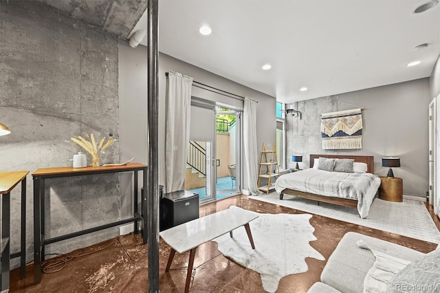 2565 Champa St, Denver, CO 80205 - bedroom featuring access to outside, concrete floors, and recessed lighting