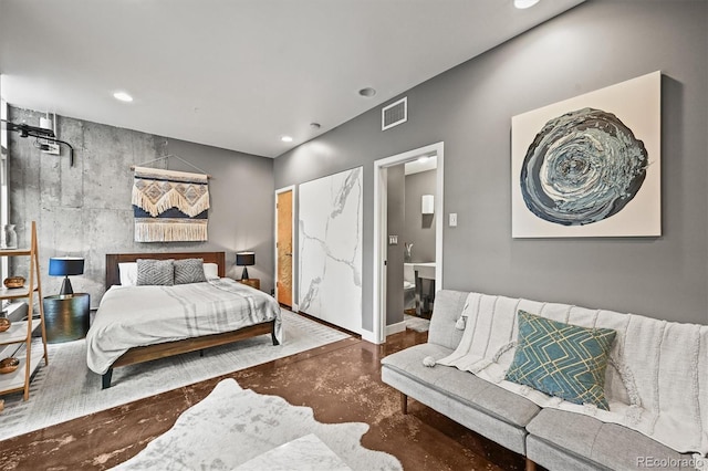 2565 Champa St, Denver, CO 80205 - bedroom featuring finished concrete floors and recessed lighting