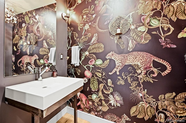2565 Champa St, Denver, CO 80205 - bathroom featuring wood finished floors and baseboards