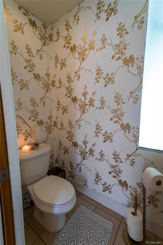 2565 Champa St, Denver, CO 80205 - bathroom with tile patterned floors and wallpapered walls