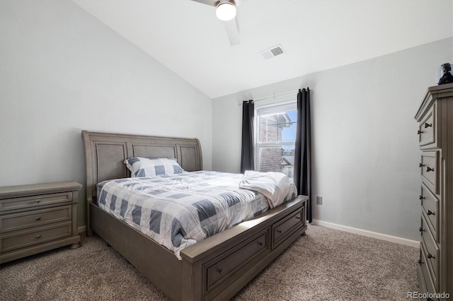 bedroom featuring ceiling fan, vaulted ceiling, and carpet