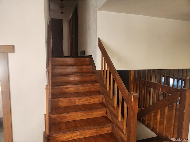 staircase with visible vents