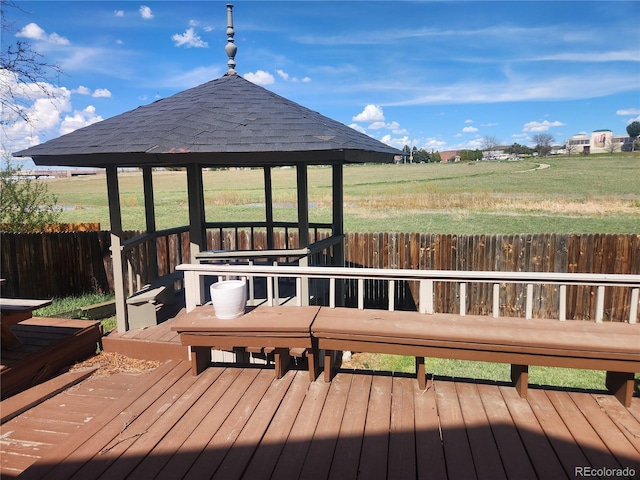deck with a gazebo and fence