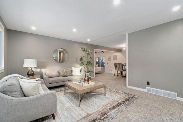 living room featuring carpet floors