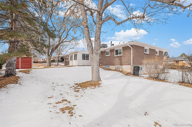 view of yard covered in snow