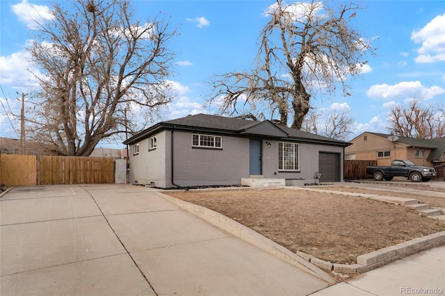 ranch-style home with a garage