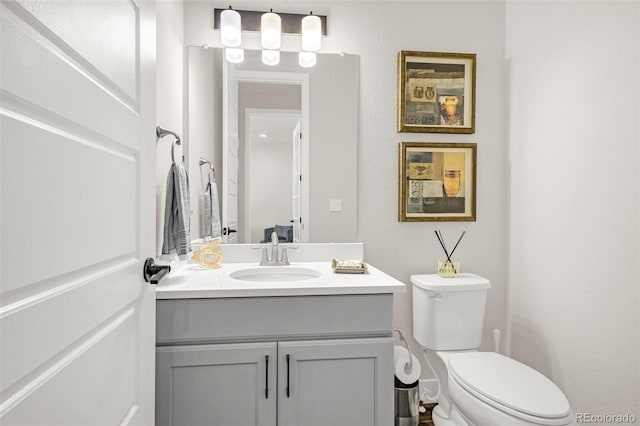 174 Rockingham Cir, Castle Pines, CO 80108 - half bathroom with vanity and toilet