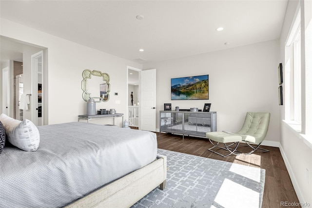 174 Rockingham Cir, Castle Pines, CO 80108 - bedroom featuring wood finished floors, recessed lighting, and baseboards