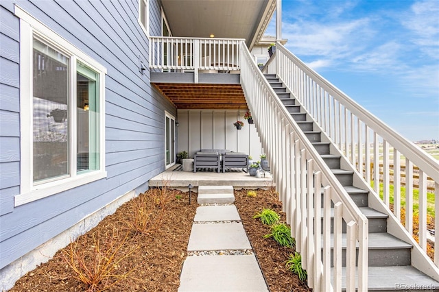 174 Rockingham Cir, Castle Pines, CO 80108 - view of side of home featuring stairs and board and batten siding