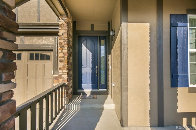 4722 S Netherland St, Centennial, CO 80015 - doorway to property with stone siding and stucco siding