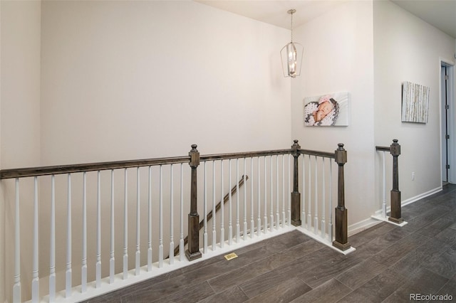 4722 S Netherland St, Centennial, CO 80015 - staircase with wood finished floors and a chandelier