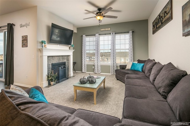 4722 S Netherland St, Centennial, CO 80015 - carpeted living area featuring a ceiling fan and a fireplace