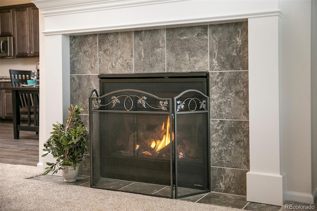 4722 S Netherland St, Centennial, CO 80015 - detailed view of a fireplace and stainless steel microwave