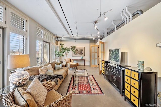 1610 Little Raven St Unit 407, Denver, CO 80202 - living room with concrete flooring and a towering ceiling