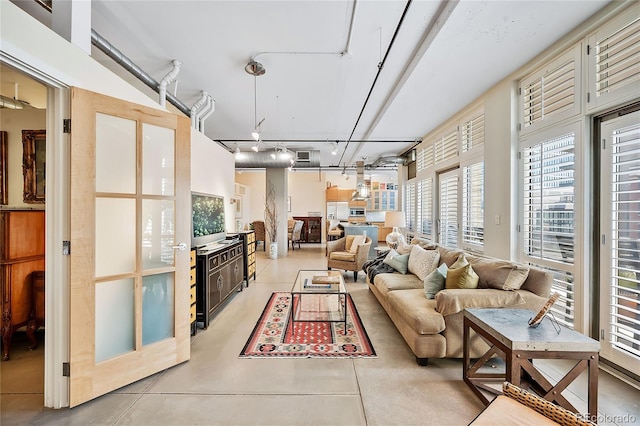 1610 Little Raven St Unit 407, Denver, CO 80202 - living room featuring concrete floors