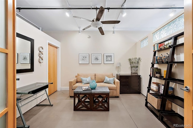1610 Little Raven St Unit 407, Denver, CO 80202 - living area featuring a ceiling fan and concrete floors