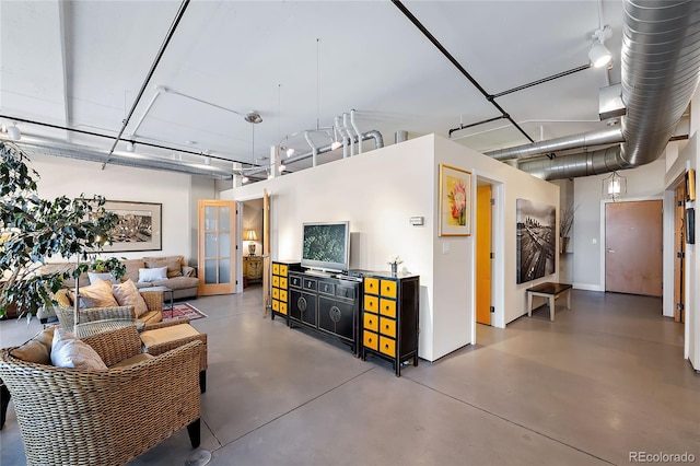 1610 Little Raven St Unit 407, Denver, CO 80202 - living area with finished concrete floors