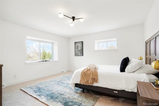 6325 W Portland Pl, Littleton, CO 80128 - bedroom with carpet flooring and baseboards