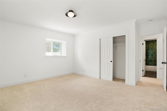 6325 W Portland Pl, Littleton, CO 80128 - unfurnished bedroom featuring light colored carpet, ornamental molding, and baseboards