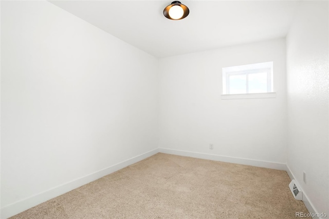 6325 W Portland Pl, Littleton, CO 80128 - unfurnished room featuring light carpet and baseboards