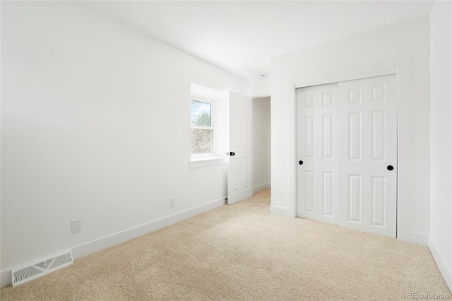6325 W Portland Pl, Littleton, CO 80128 - unfurnished bedroom with carpet, a closet, and baseboards
