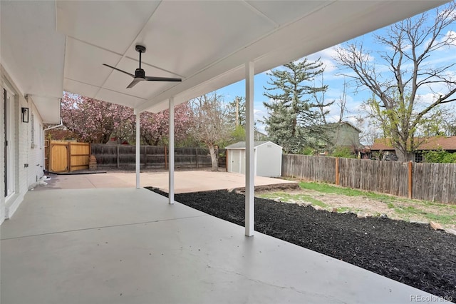 6325 W Portland Pl, Littleton, CO 80128 - fenced backyard featuring a patio area and ceiling fan