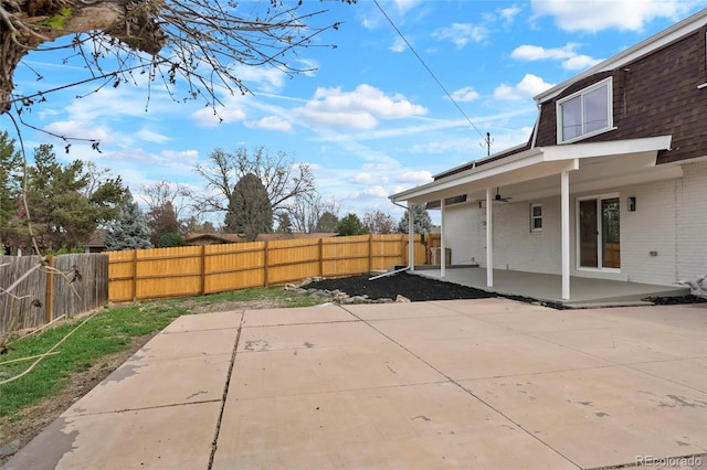 6325 W Portland Pl, Littleton, CO 80128 - fenced backyard with a patio
