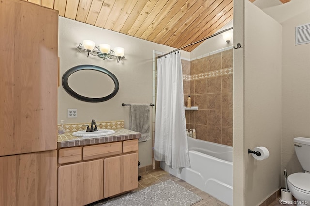 12191 Tecumseh Trl, Conifer, CO 80433 - full bathroom with toilet, vanity, shower / tub combo, tile patterned flooring, and lofted ceiling