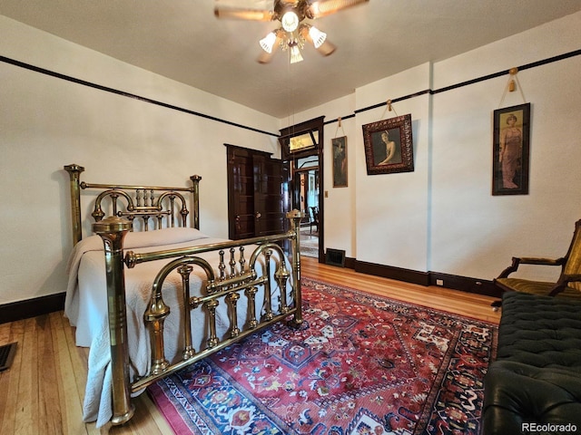 243 Park Ave, Salida, CO 81201 - bedroom featuring wood finished floors and baseboards
