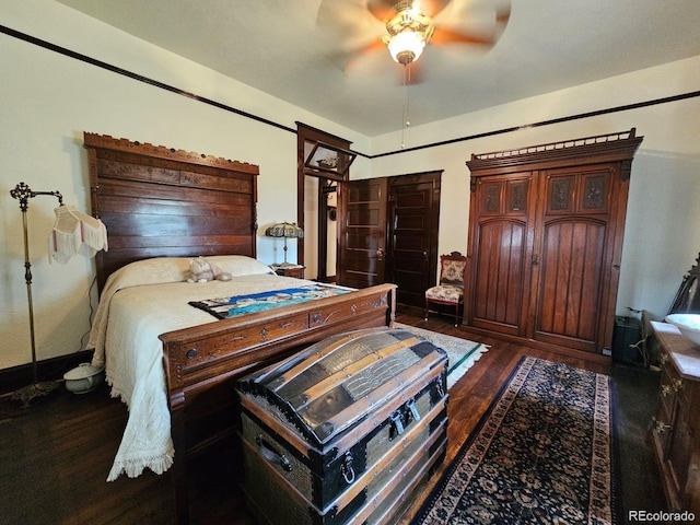 243 Park Ave, Salida, CO 81201 - bedroom featuring dark wood-style floors and a ceiling fan