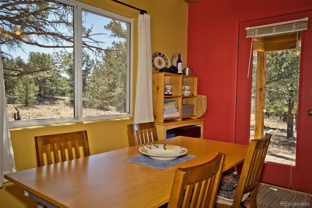 3713 Enchanted Way, Crestone, CO 81131 - dining space featuring a wealth of natural light