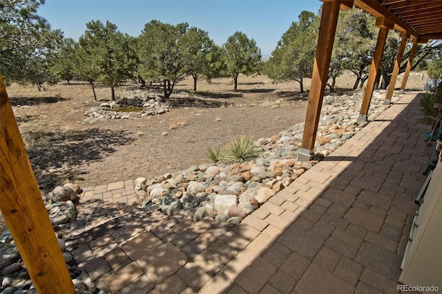 3713 Enchanted Way, Crestone, CO 81131 - exterior space with a patio and a rural view