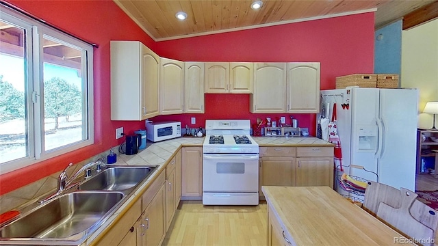 kitchen featuring a sink, white appliances, tile countertops, recessed lighting, and wood ceiling