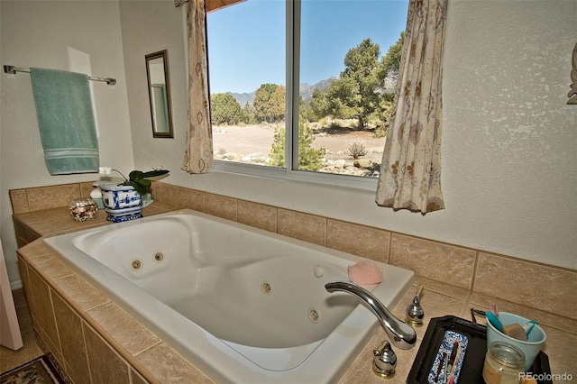 3713 Enchanted Way, Crestone, CO 81131 - bathroom with a jetted tub and a textured wall