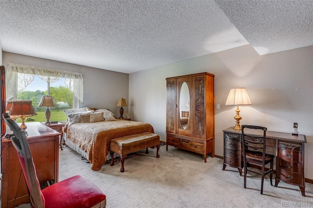 12565 Sheridan Blvd Unit 105, Broomfield, CO 80020 - bedroom featuring a textured ceiling and carpet