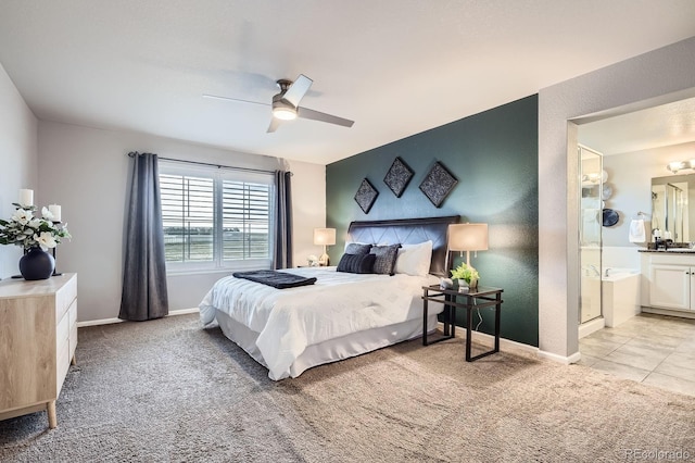 8695 Torrey St, Arvada, CO 80007 - carpeted bedroom with ensuite bathroom, ceiling fan, and baseboards