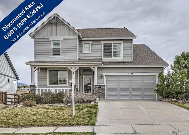 8695 Torrey St, Arvada, CO 80007 - craftsman-style home featuring a porch, driveway, a shingled roof, and board and batten siding