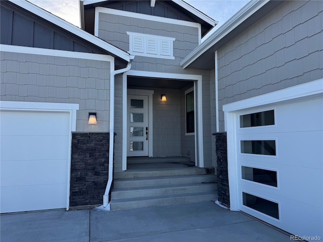 property entrance featuring board and batten siding